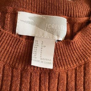 high neck rust colored sweater top